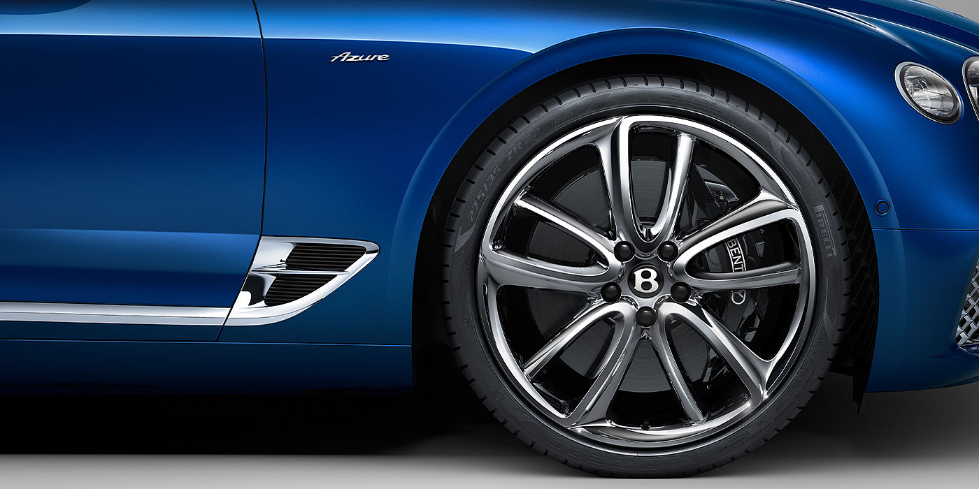 Bentley Cambridge Bentley Continental GTC Azure convertible in Sequin Blue paint side profile with Azure badge close up